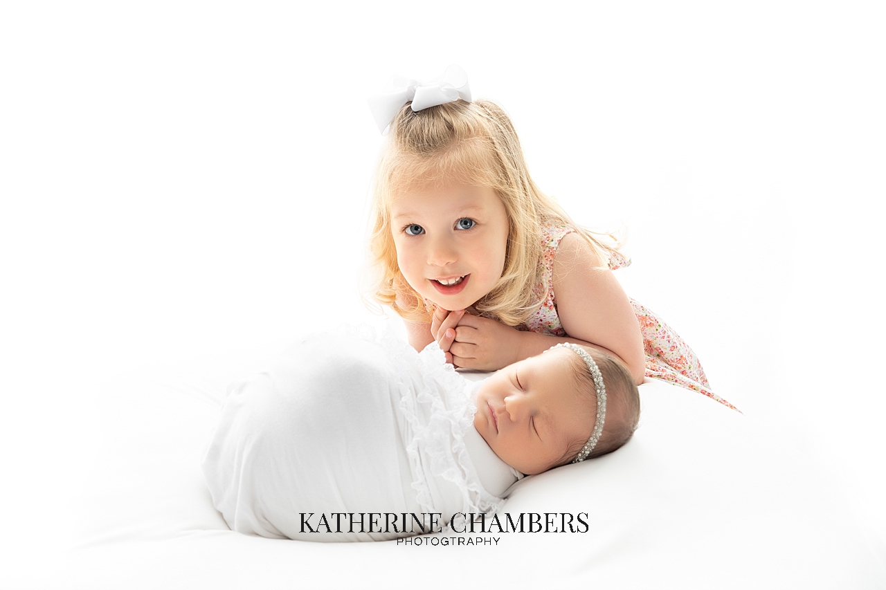 Sibling with Newborn Photography