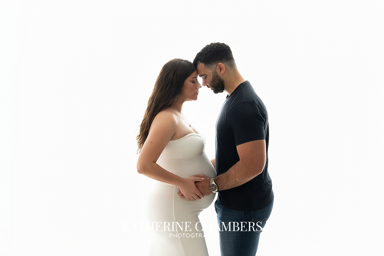 Romantic maternity photos of couple awaiting their first baby