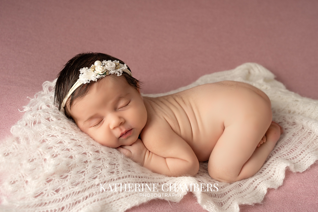 Newborn bum up pose