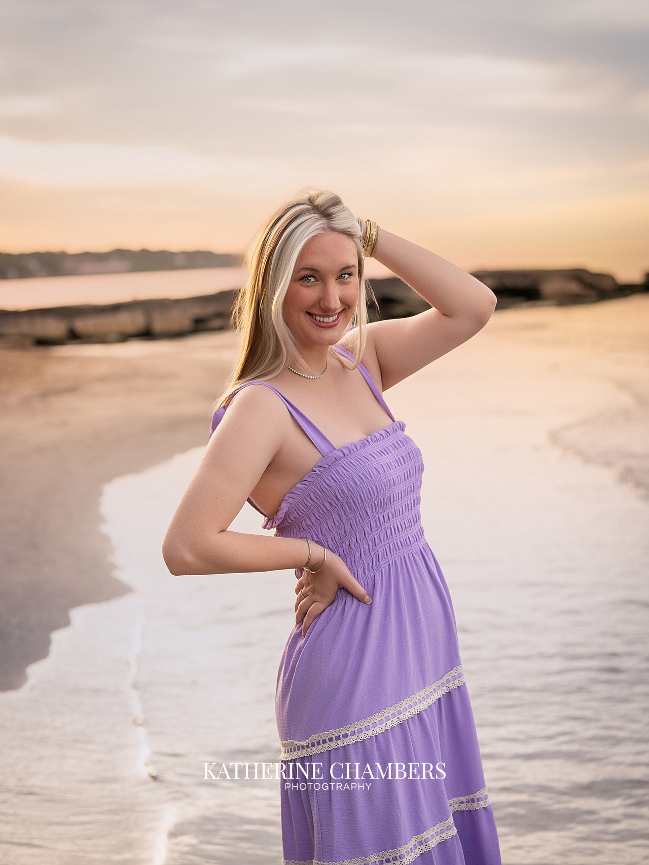 Senior girl Lizzy by Lake Erie at sunset during her Cleveland senior session