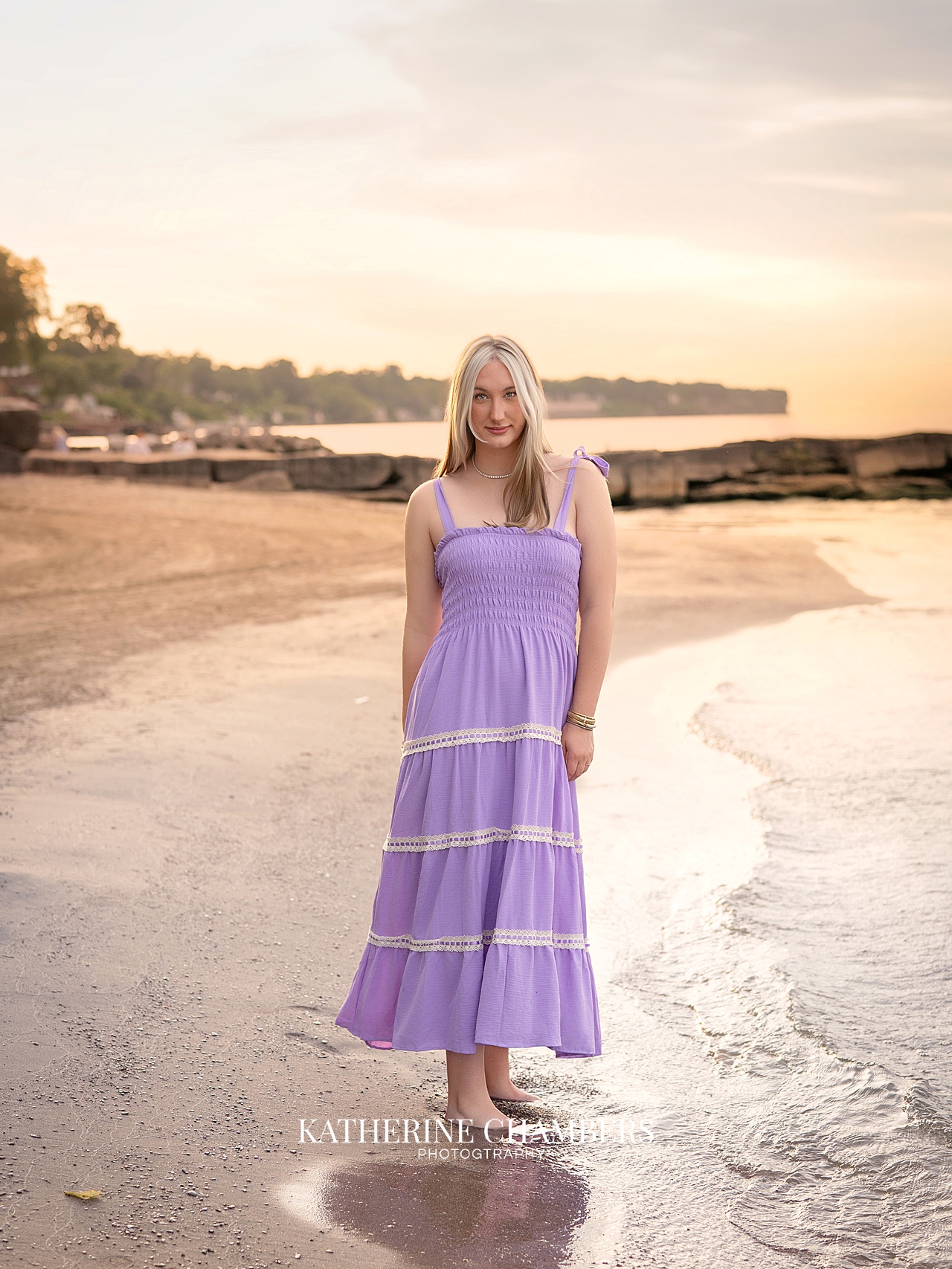 Beach senior photos of Lizzy in Cleveland with soft sunset light