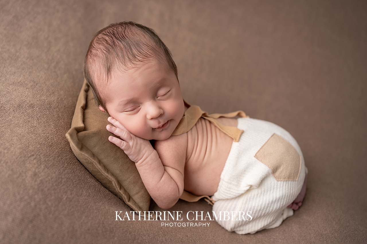 Sleepy newborn baby James in studio session Cleveland Ohio
