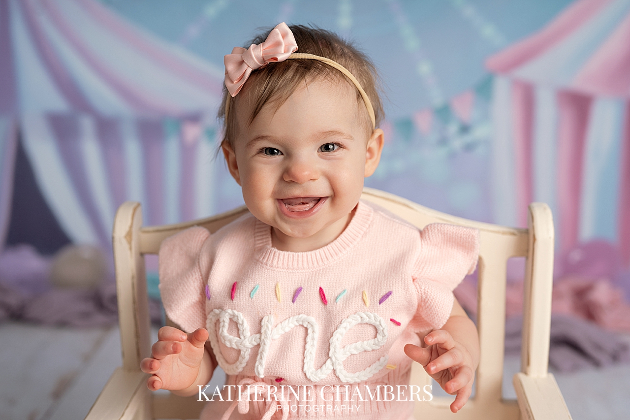 Smiling one year baby girl