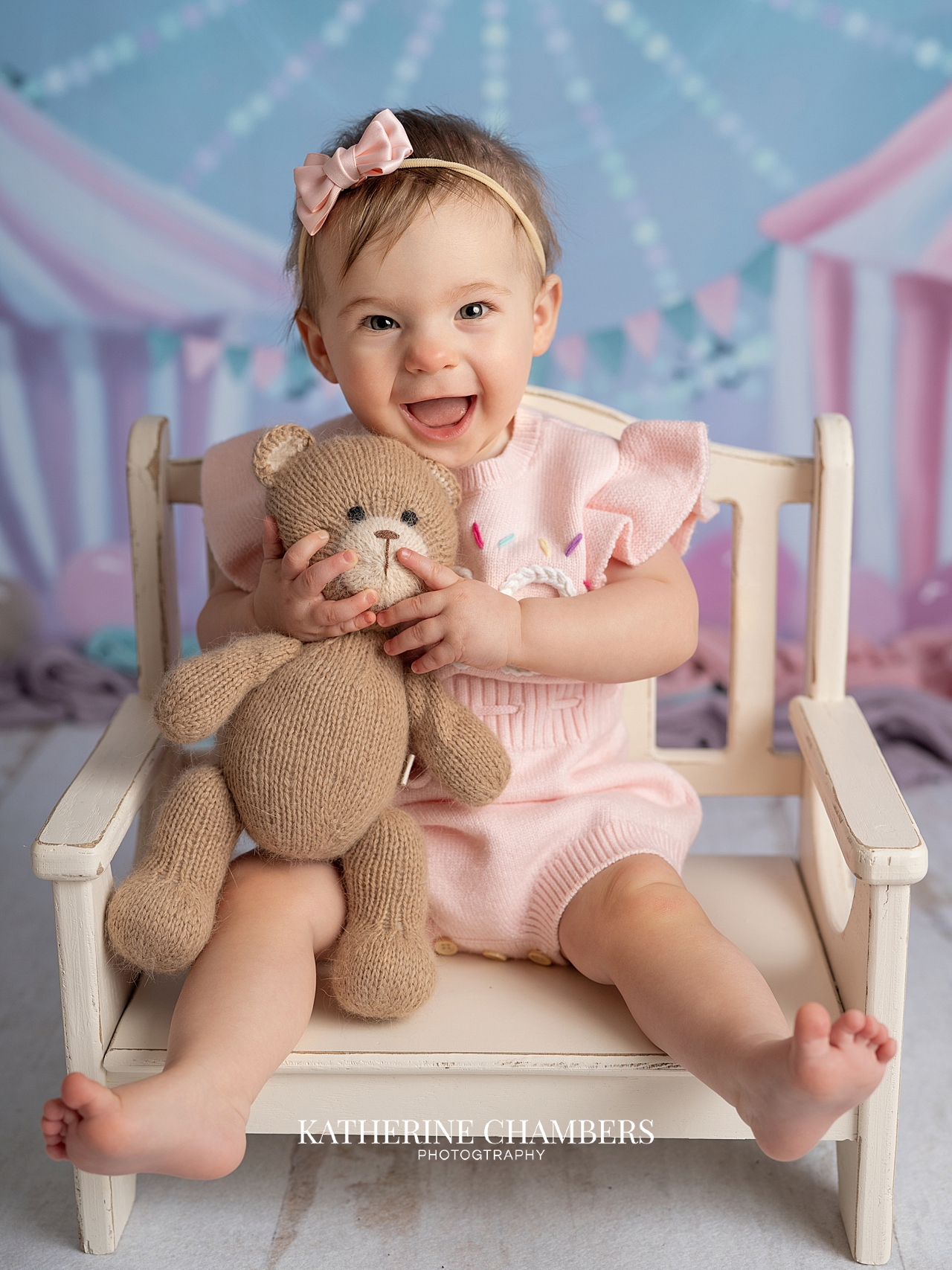 One year girl with teddy bear