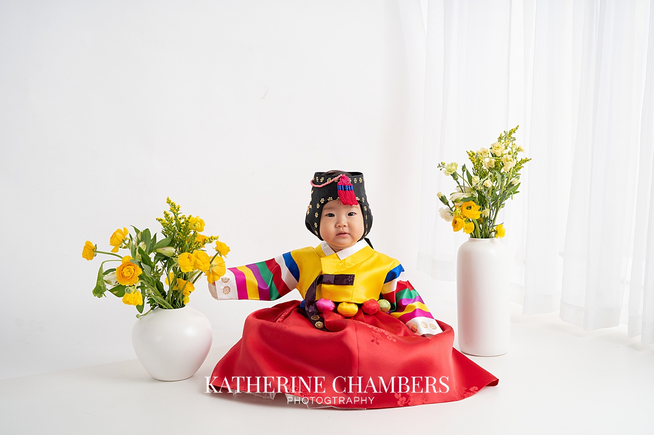 Baby girl wearing a traditional Korean hanbok for her doljabi celebration