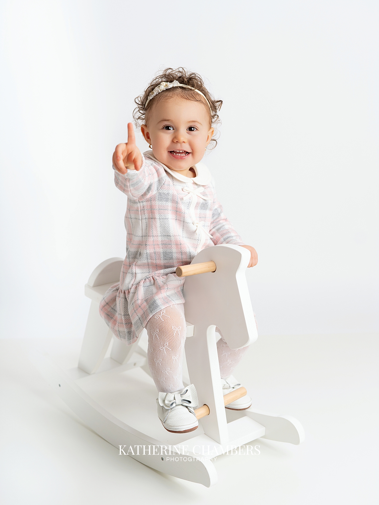 Toddler girl at her sister's newborn session.
