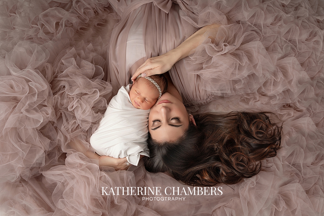 Mother and newborn portrait.