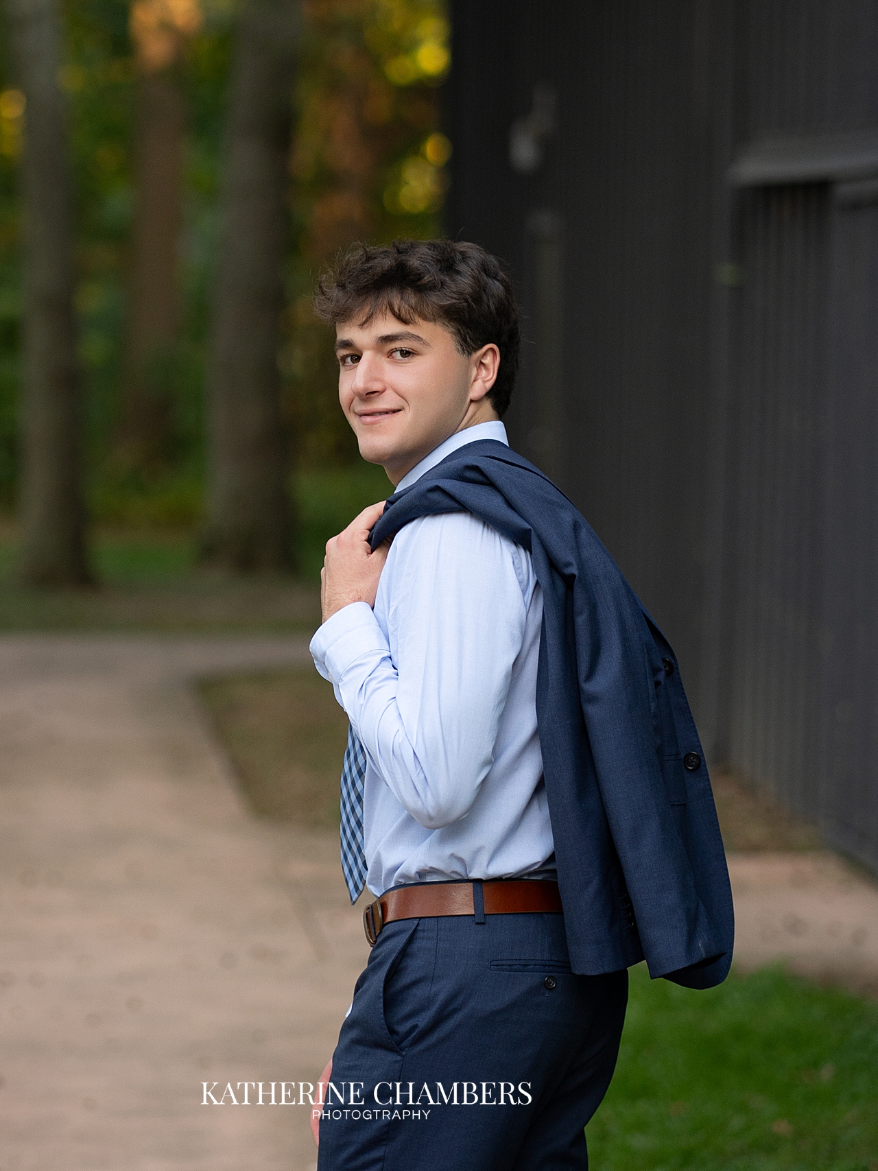 Senior boy in a suit during his Cleveland senior photography session