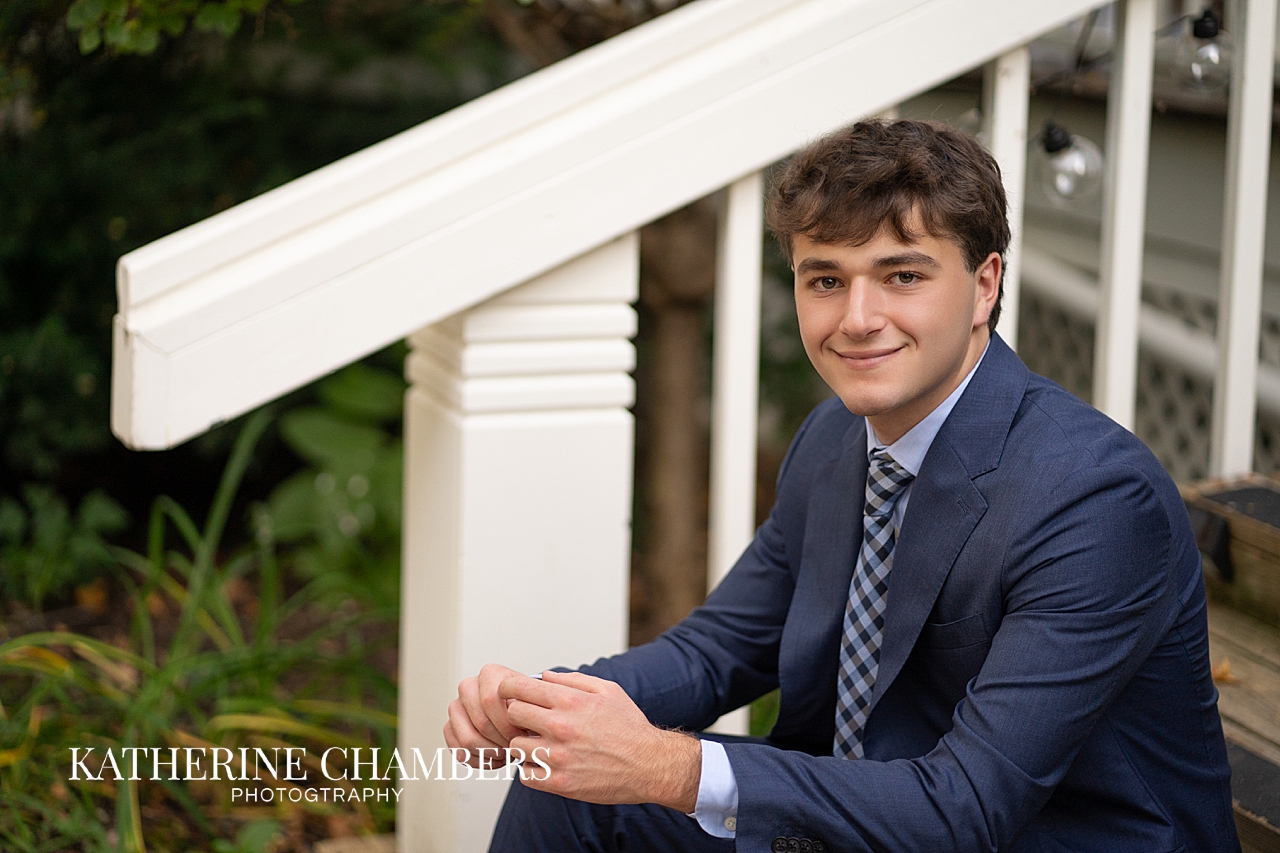 Daniel posing in a suit during his Saint Ignatius senior portrait session