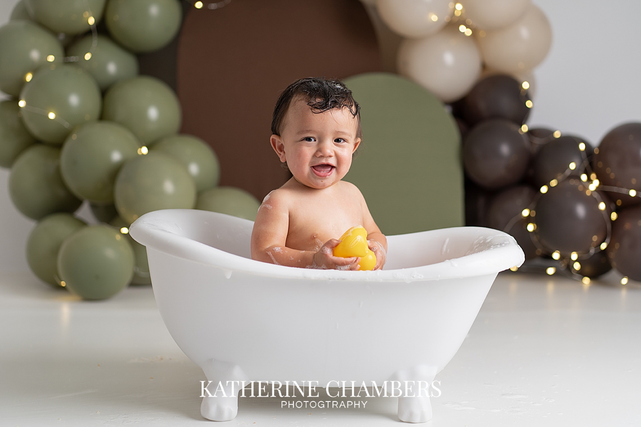 EJ's bathtub clean up after his cake smash
