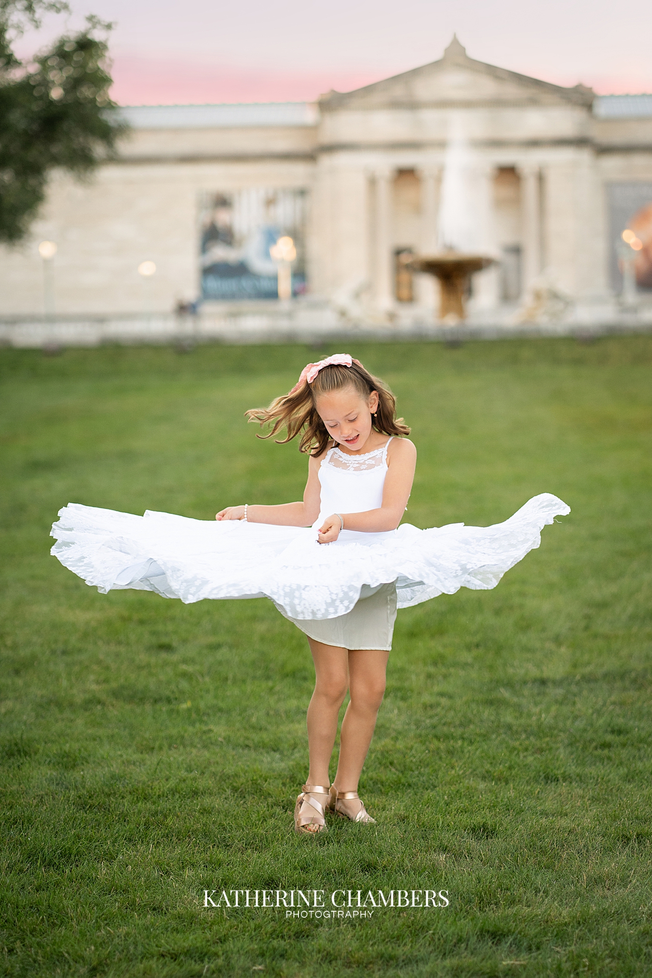 Audrey twirling in a dress during her Cleveland Museum of Art family photography session