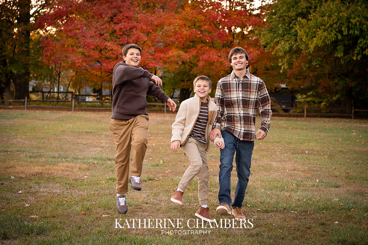 Candid fall photos of 3 brothers