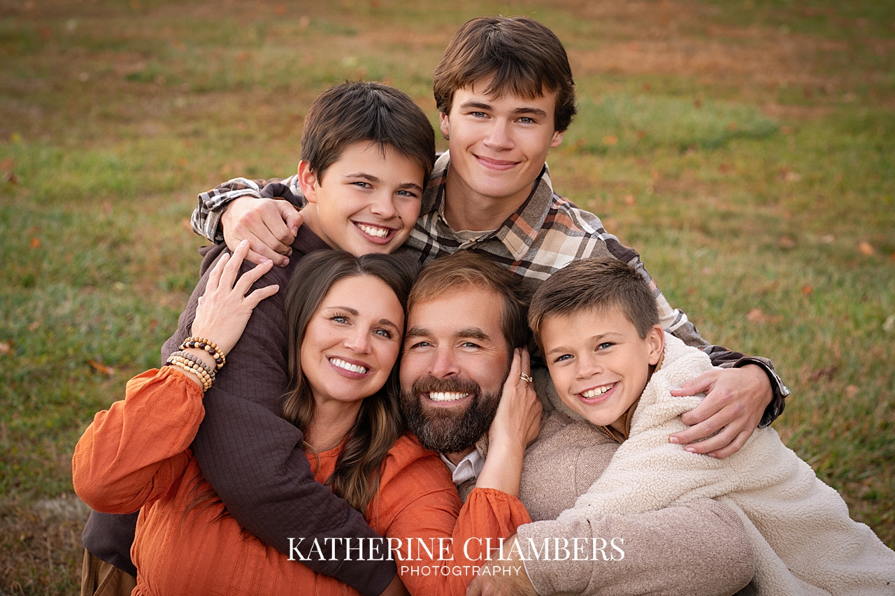 Family of 5 enjoying an outdoor family photo session